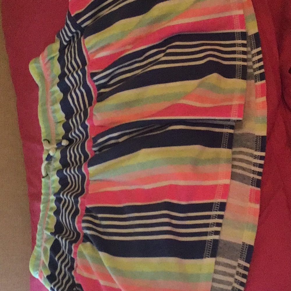 Youth 10-12 loose rainbow striped skirt.